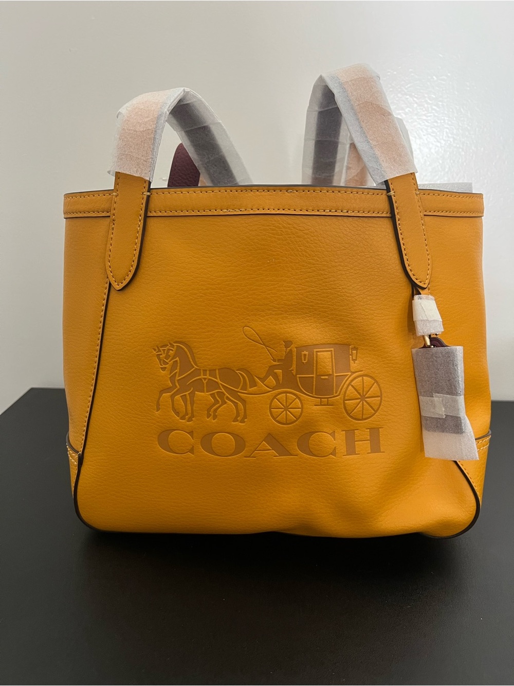 Coach Mustard Yellow Embossed Logo Tote